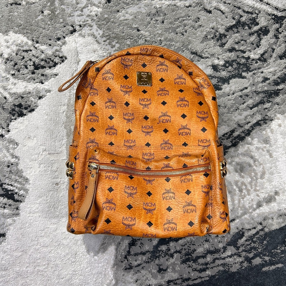 MCM Worldwide Unisex Backpack Cognac Brown Leather Printed Studded Pockets‎ Bag
